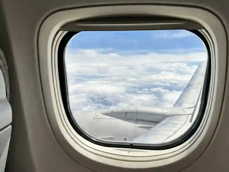 A plane passenger window made of acrylic.