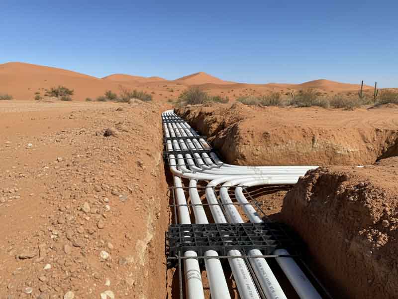 Reprocessed HDPE duct bank/conduit spacers in use.