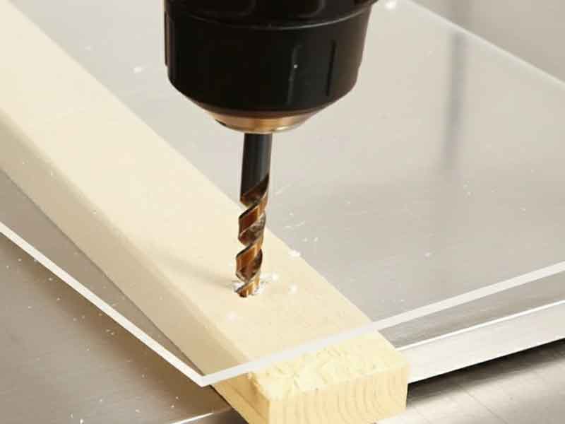 Drilling holes in acrylic requires the right drill bit and technique to produce clean, smooth holes.