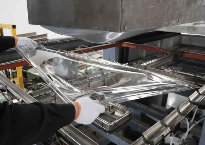 Thermoforming polycarbonate in a mold.