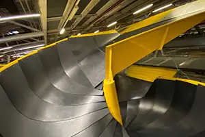 UHMW is a durable and self-lubricating choice for chute and hopper liners.